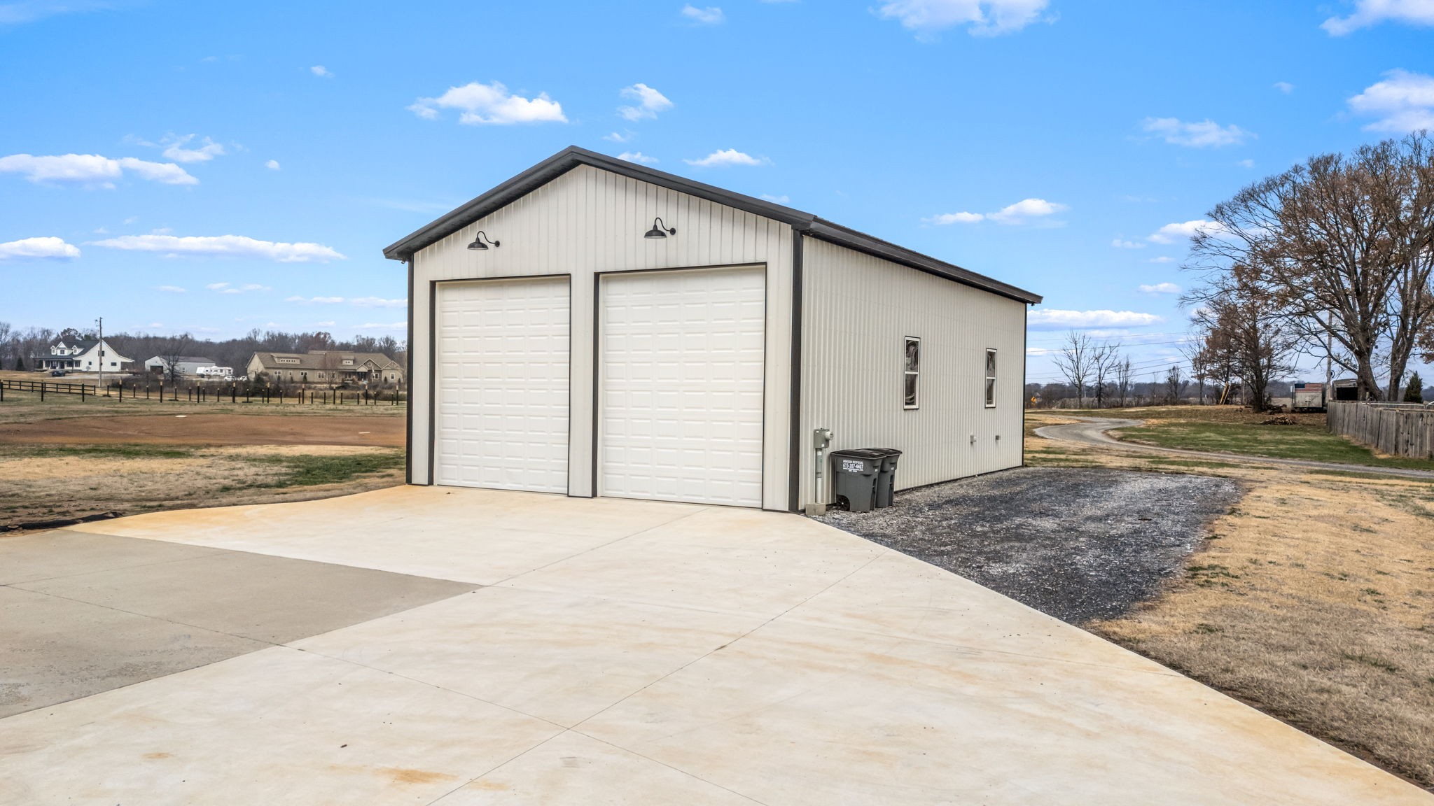 5296 Cross Plains Road White House, TN 37188 - Photo 68 of 87 a view of a house with a yard and garage