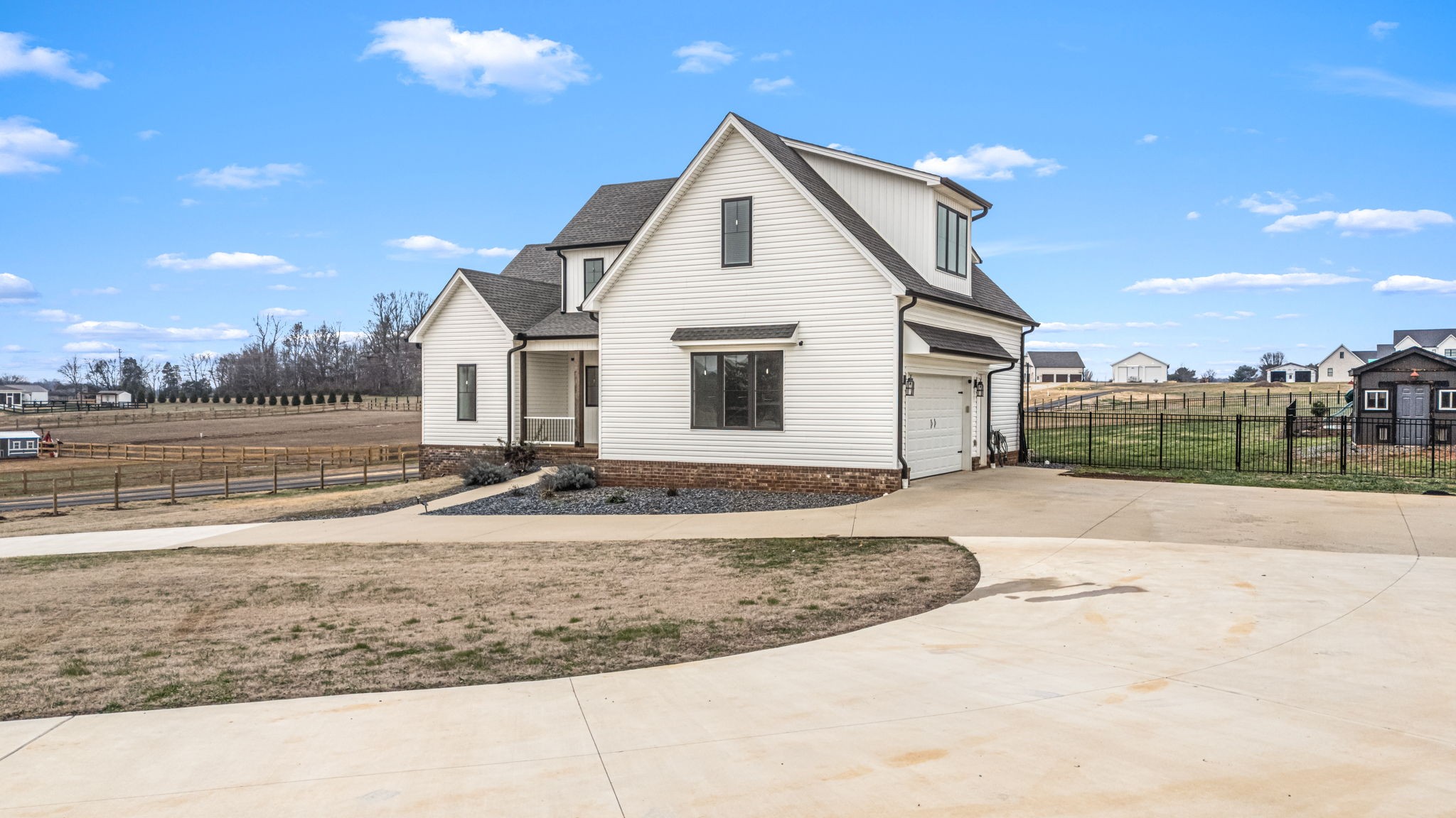 5296 Cross Plains Road White House, TN 37188 - Photo 80 of 87 a view of a house with a yard and potted plants