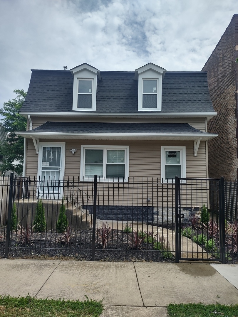 11531 South Perry Avenue Chicago, IL 60628 - Photo 2 of 16 front view of a house