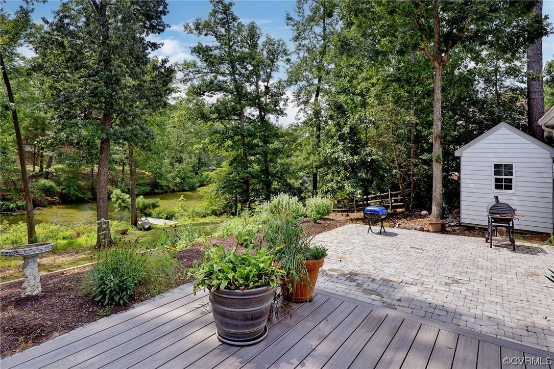 104 Lawnes Circle Williamsburg, VA 23185 - Photo 32 of 49 a view of a backyard with sitting area and garden