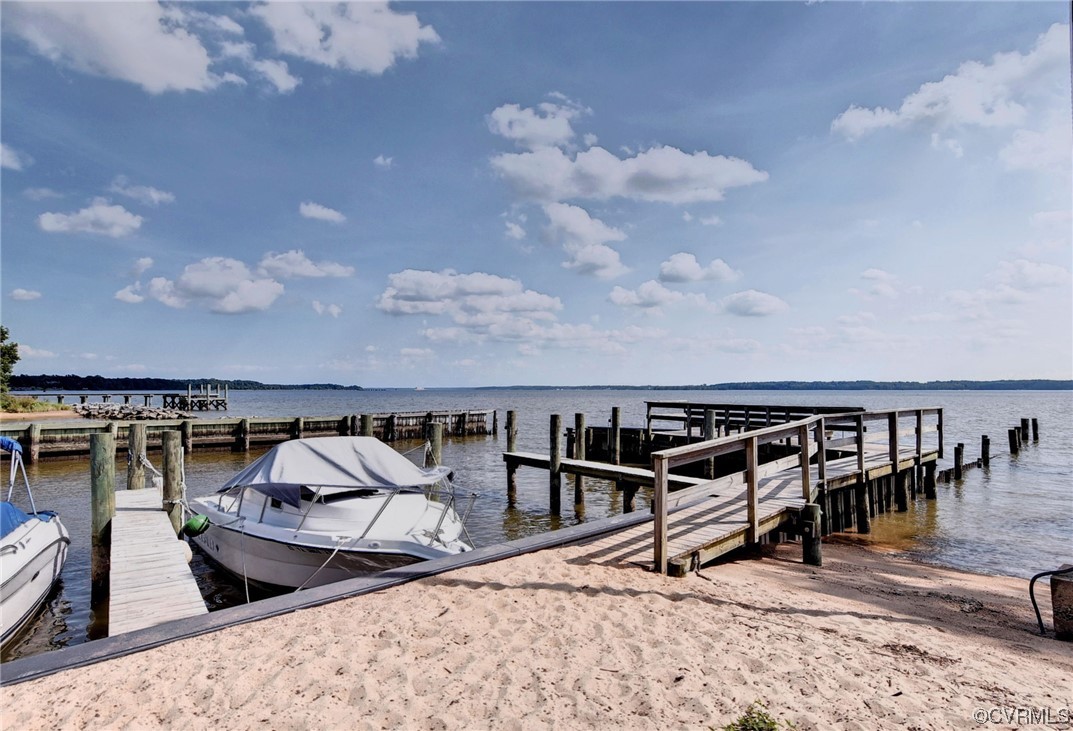 104 Lawnes Circle Williamsburg, VA 23185 - Photo 48 of 49 a view of a roof deck with chair and wooden floor