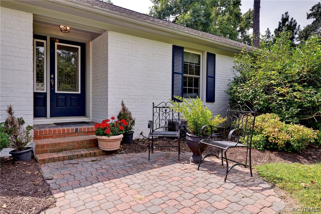 104 Lawnes Circle Williamsburg, VA 23185 - Photo 5 of 49 a backyard of a house with outdoor seating