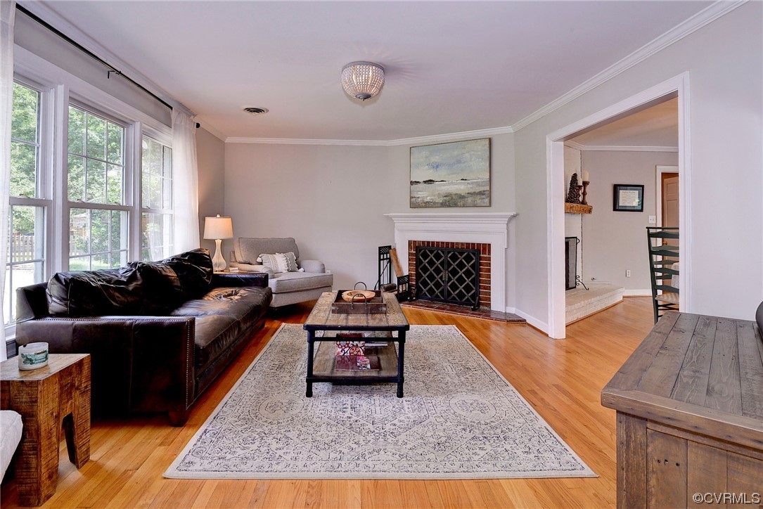104 Lawnes Circle Williamsburg, VA 23185 - Photo 7 of 49 a living room with furniture windows and a fireplace