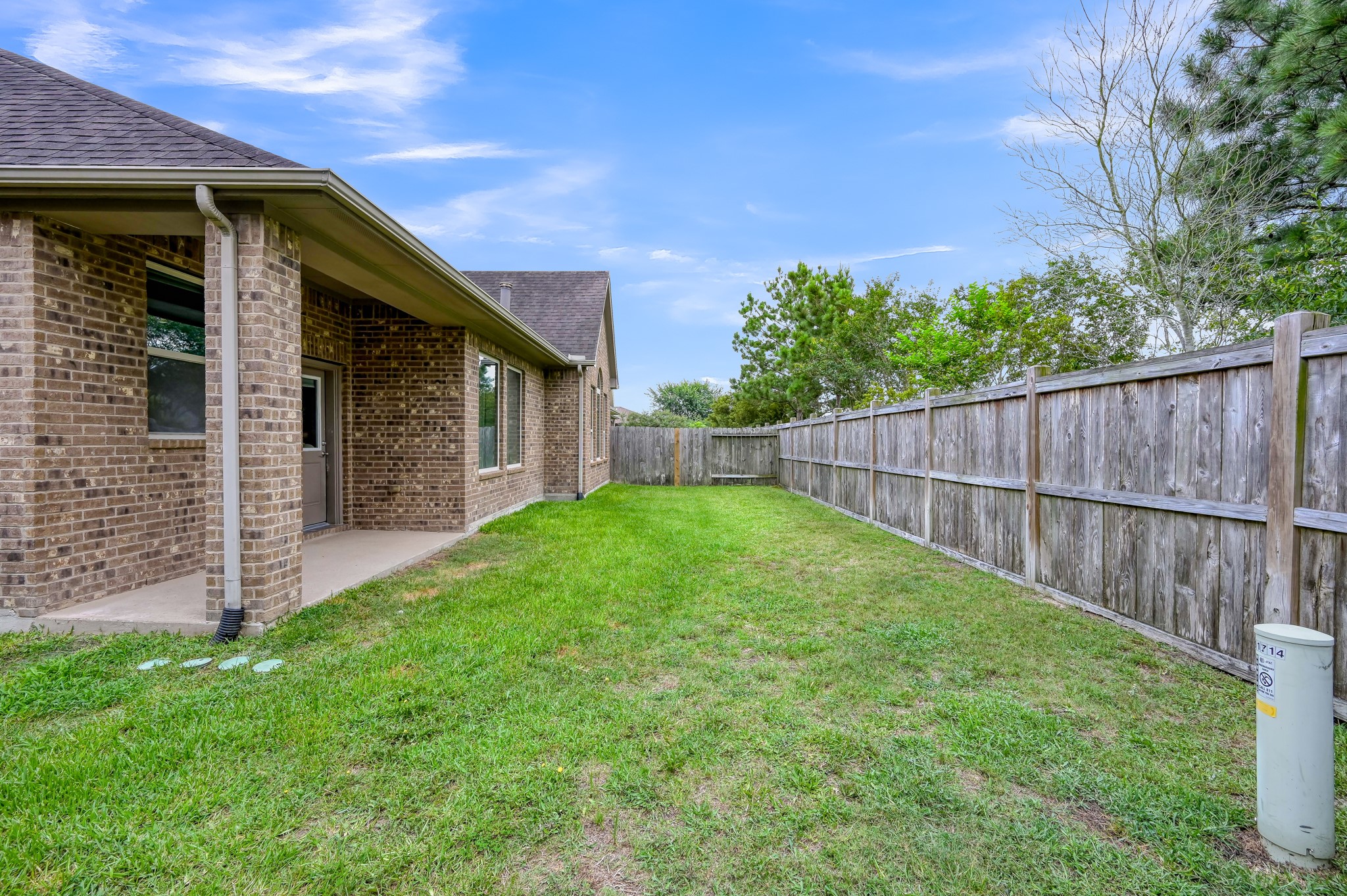 31714 Pierwood Court Spring, TX 77386 - Photo 36 of 49 a view of a backyard with a garden