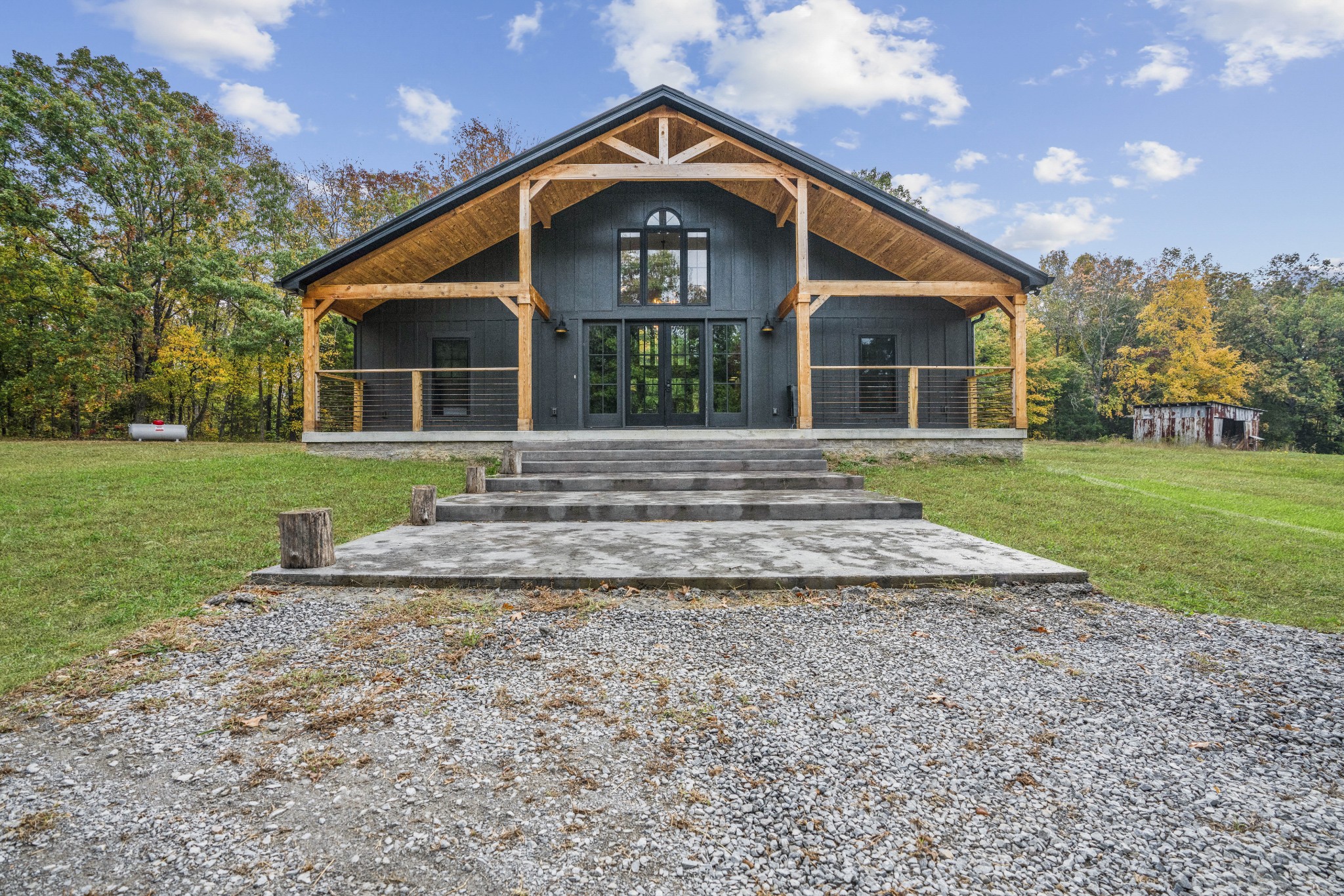 3320 Slayden-Marion Road Cumberland Furnace, TN 37051 - Photo 2 of 43 a front view of a house with a yard
