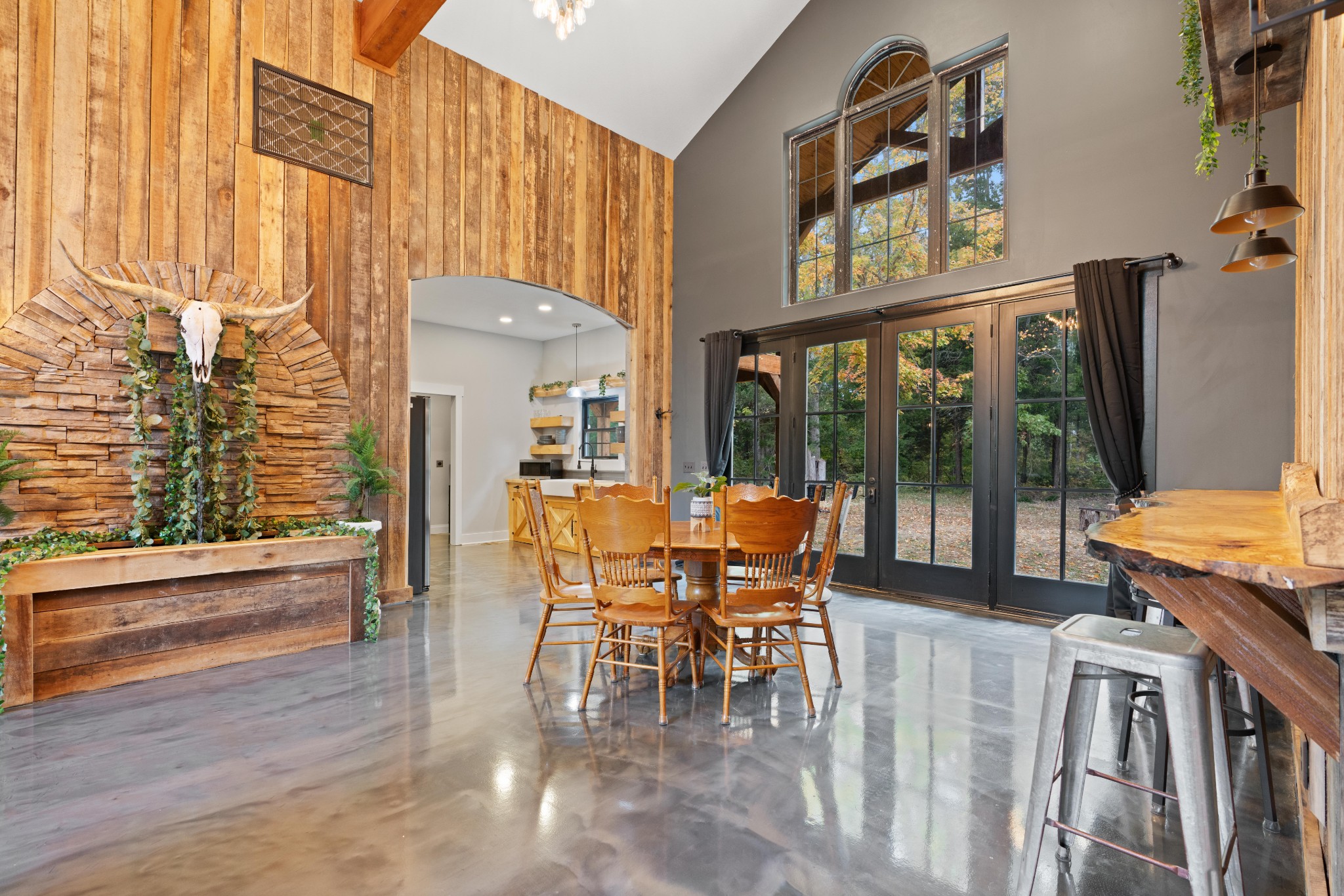 3320 Slayden-Marion Road Cumberland Furnace, TN 37051 - Photo 29 of 43 a dining room with furniture water view and a floor to ceiling window