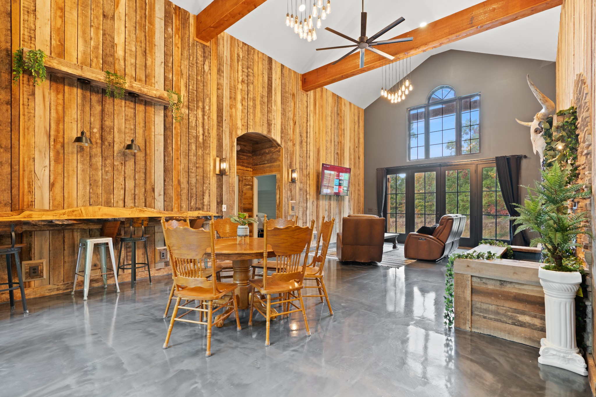3320 Slayden-Marion Road Cumberland Furnace, TN 37051 - Photo 31 of 43 a view of a patio with a table and chairs and potted plants
