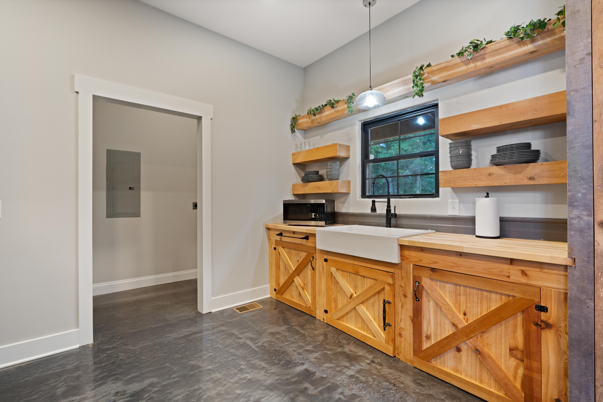3320 Slayden-Marion Road Cumberland Furnace, TN 37051 - Photo 32 of 43 a kitchen with stainless steel appliances granite countertop a sink and cabinets