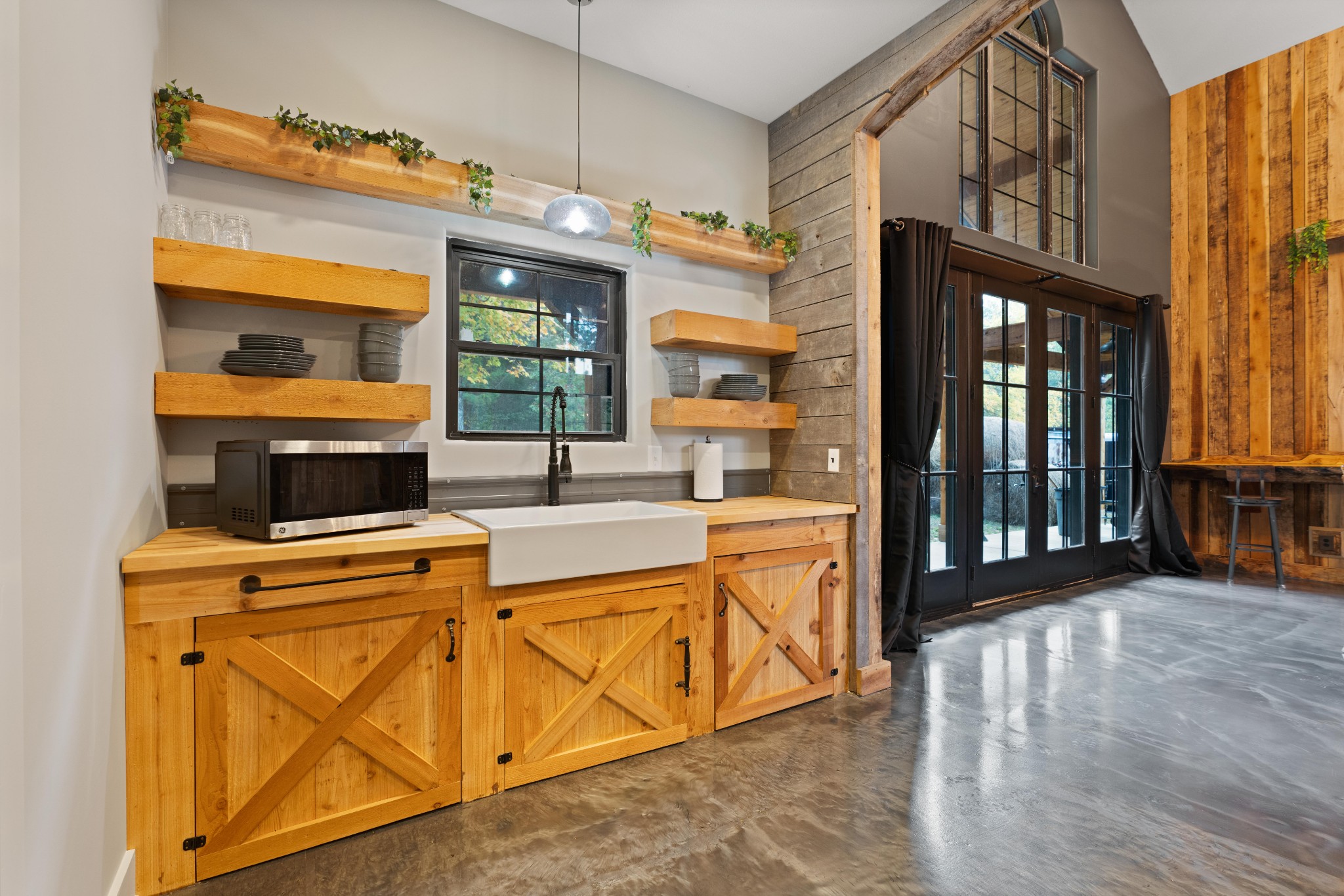 3320 Slayden-Marion Road Cumberland Furnace, TN 37051 - Photo 33 of 43 a kitchen that has a stove and a microwave oven