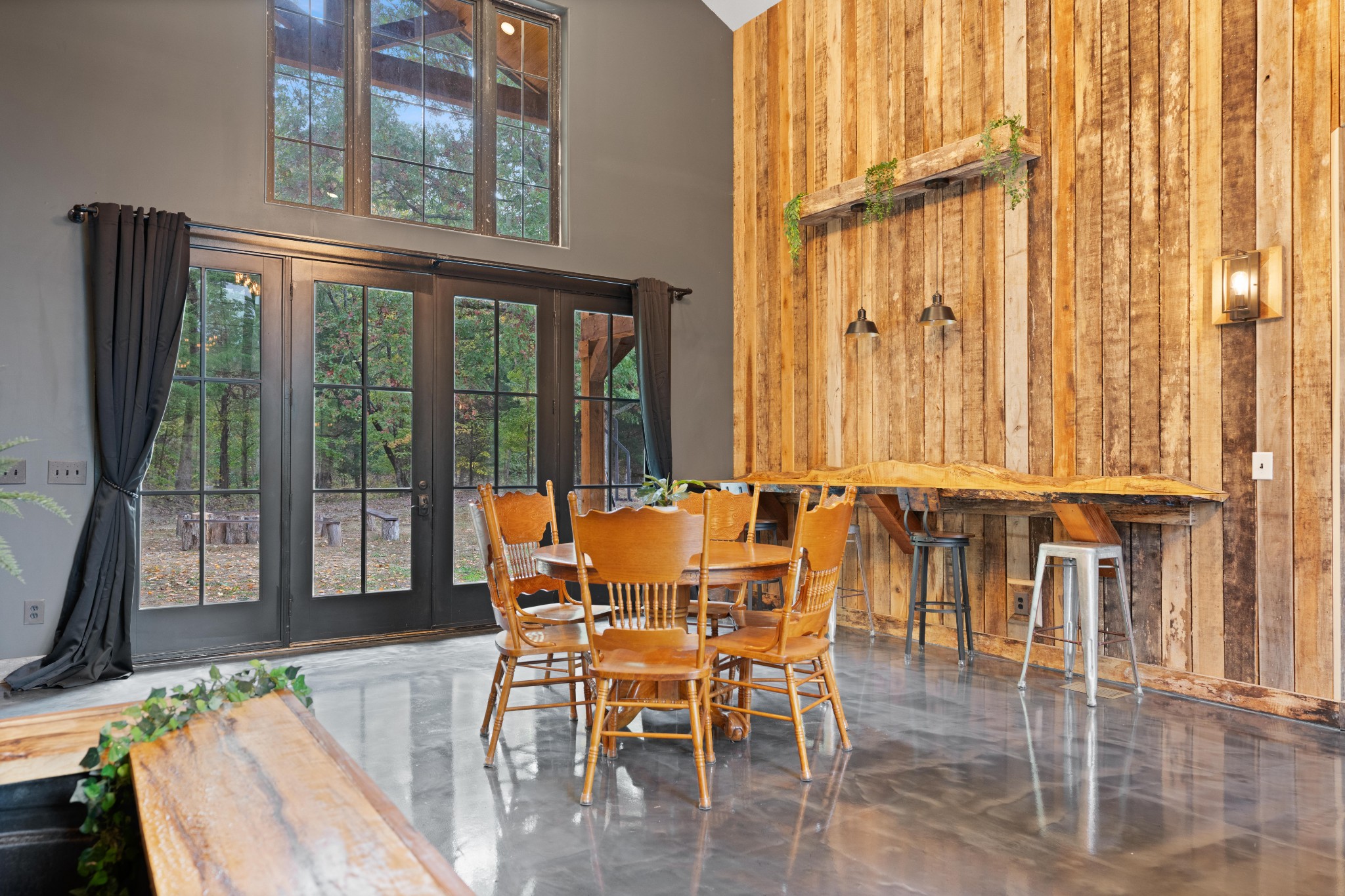 3320 Slayden-Marion Road Cumberland Furnace, TN 37051 - Photo 37 of 43 a dining room with furniture large windows and a chandelier