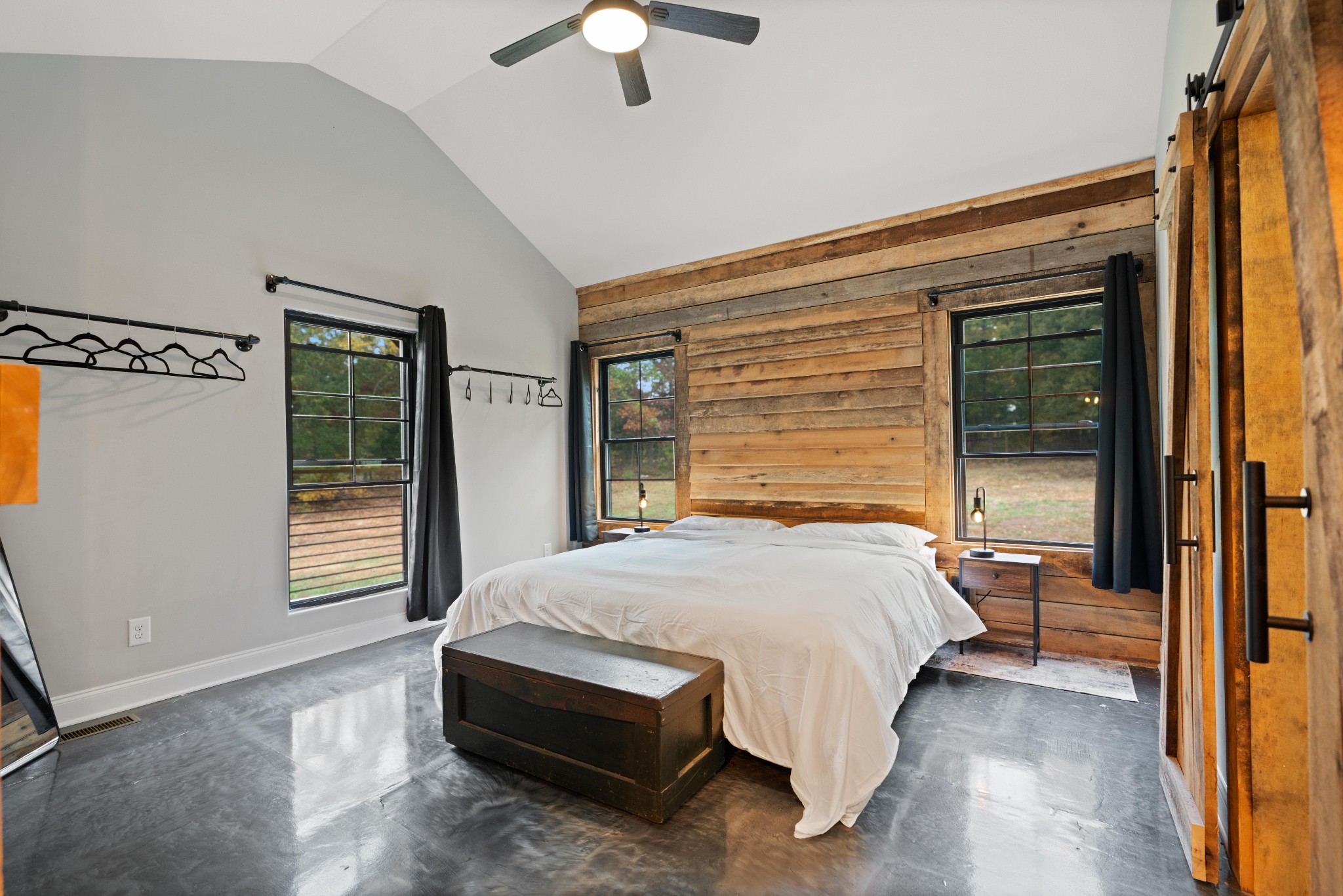 3320 Slayden-Marion Road Cumberland Furnace, TN 37051 - Photo 8 of 43 a bedroom with a bed and a large window