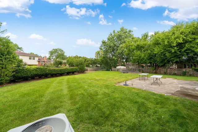 a view of a backyard with a garden