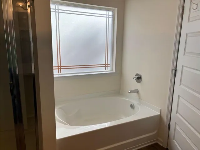 a stove top oven sitting inside of a kitchen