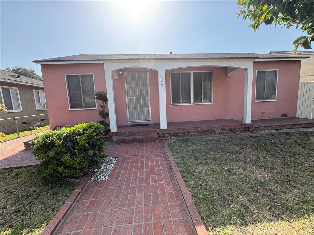14023 Studebaker Road Norwalk, CA 90650 - Photo 4 of 33 a front view of house with yard