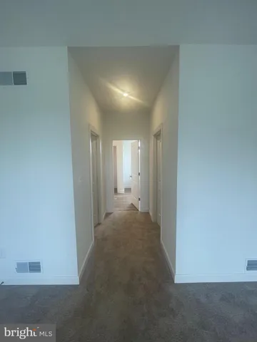 a view of hallway with stairs