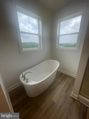 a view of a bathtub in a room
