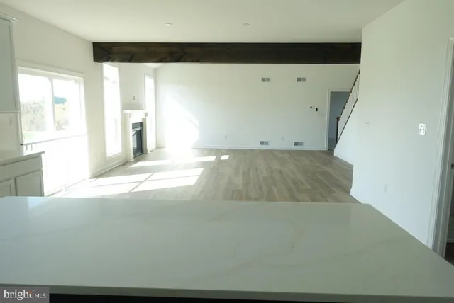 a view of a living room with a window