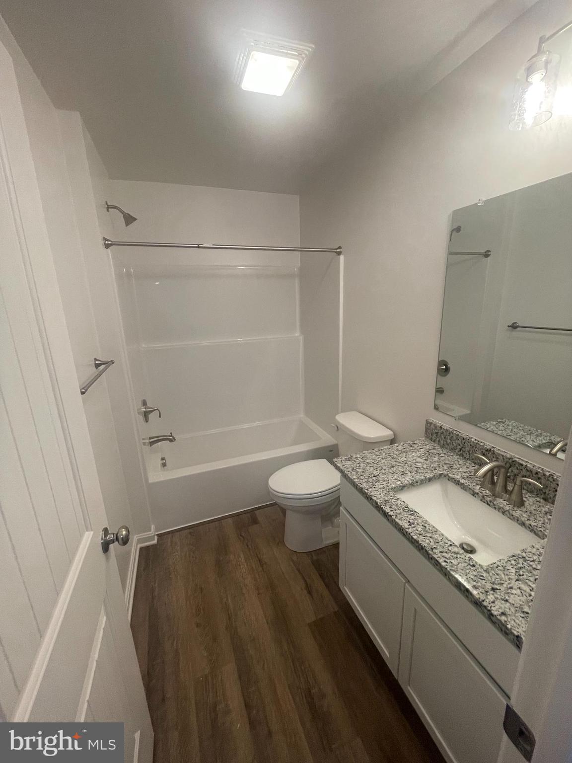 347 Steeple View Drive, Unit 11 Hanover, PA 17331 - Photo 38 of 47 a bathroom with a granite countertop sink toilet and shower