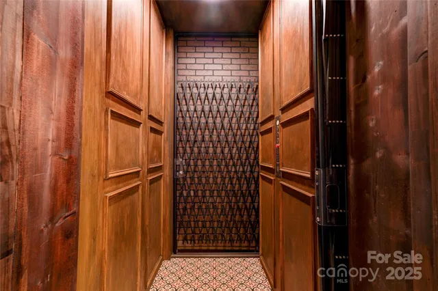 a vase of flowers sitting on a table next to a window