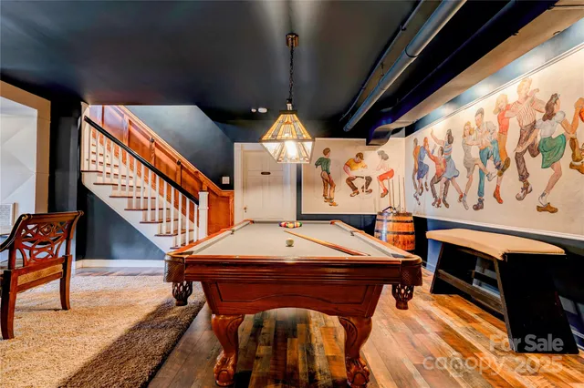 a outdoor space with a table and chairs