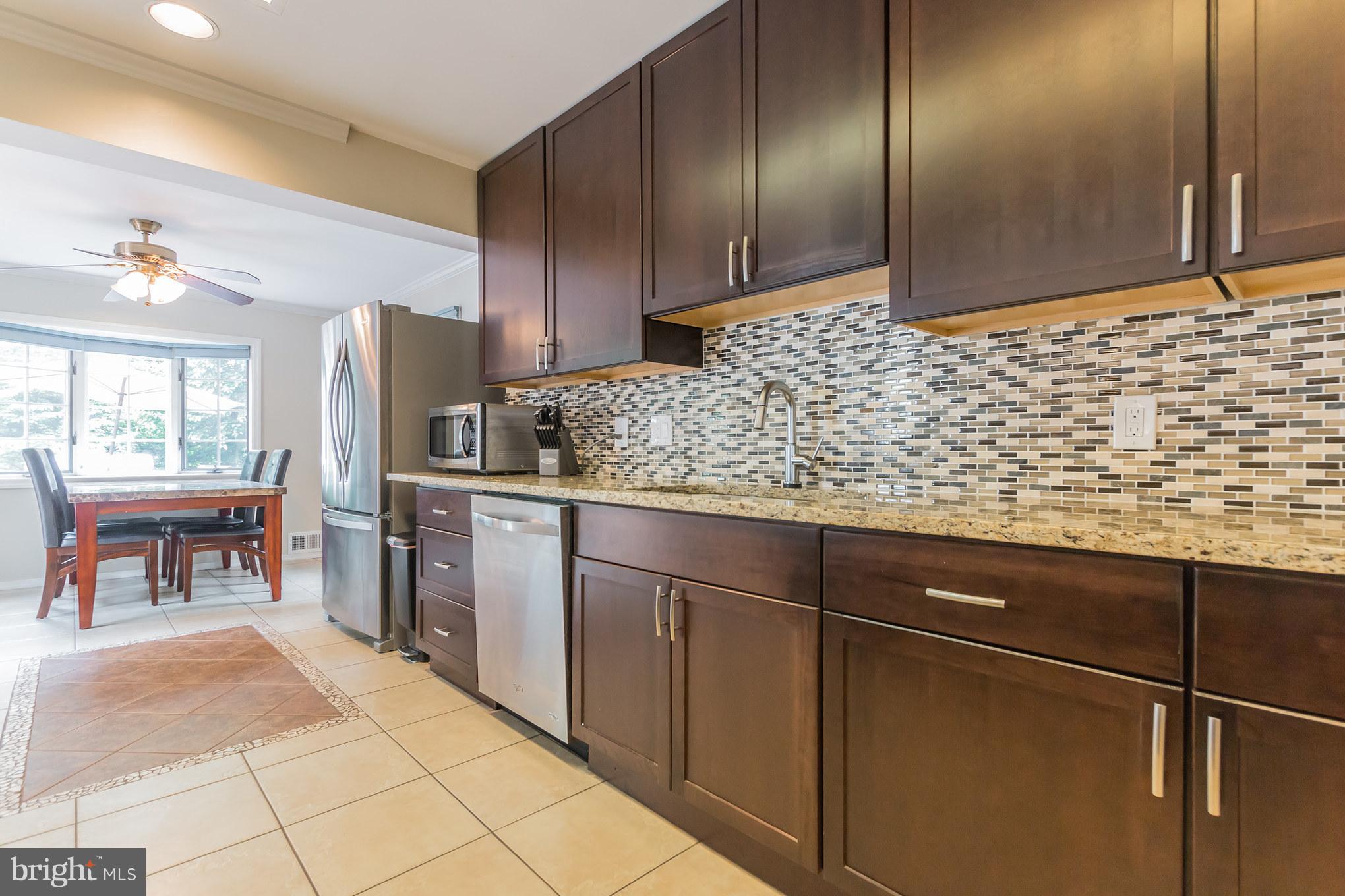 4207 Southend Road Rockville, MD 20853 - Photo 14 of 30 Kitchen with breakfast room addition