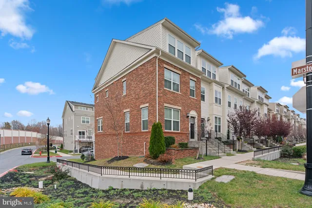 a view of a building with a yard