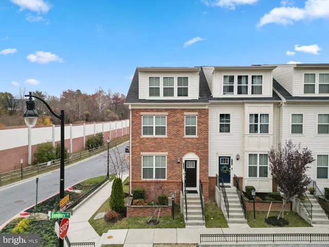 a front view of residential houses with street