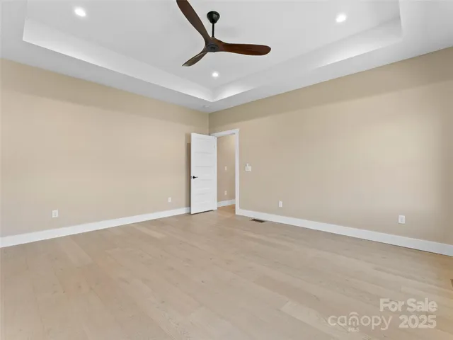 a bathroom with a double vanity sink toilet and shower
