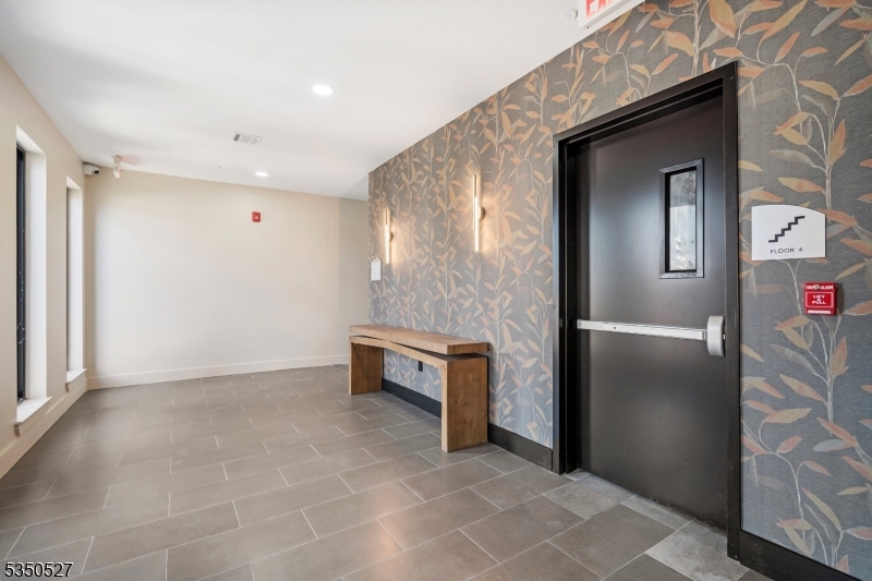 310 West Jersey Street, Unit 404 Elizabeth, NJ 07202 - Photo 10 of 14 a view of an empty room with a window