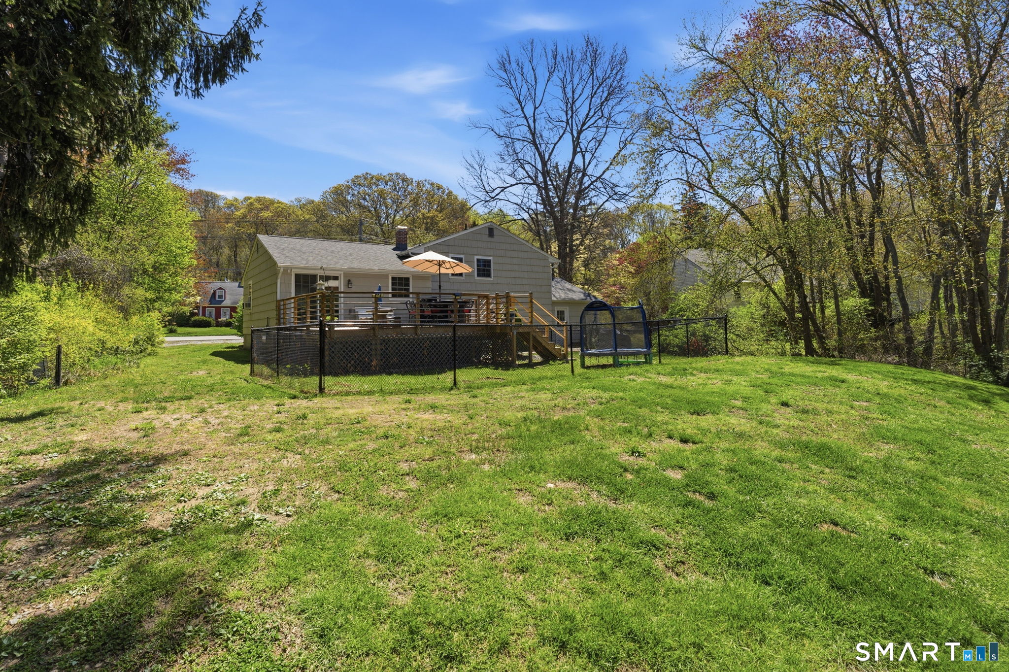 523 Essex Road Westbrook, CT 06498 - Photo 31 of 37 a view of a house with a backyard