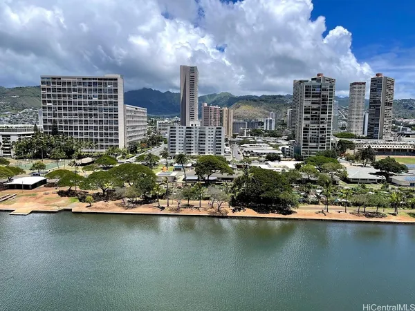 a view of a city with tall buildings