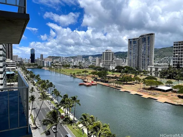 a view of a lake with a city