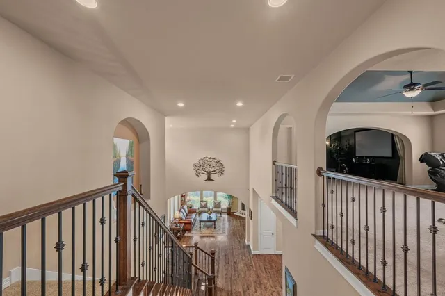 a view of a hallway view with staircase