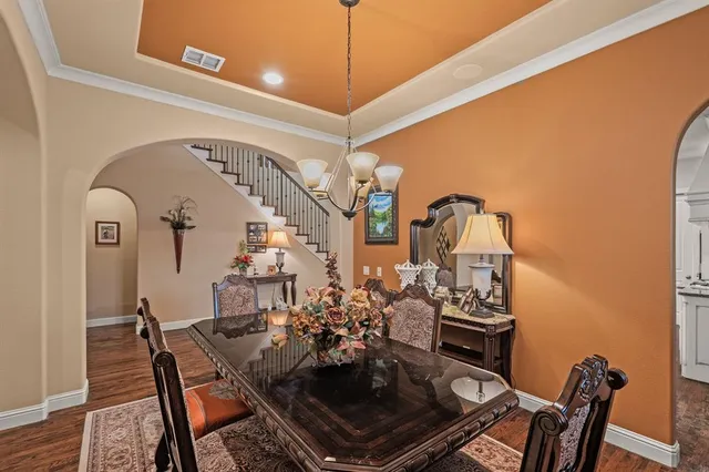 a view of a dining room with furniture