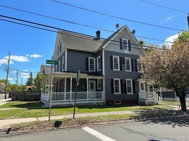 45 Ward Street Wallingford, CT 06492 - Photo 1 of 1 a view of a house with a small yard and potted plants