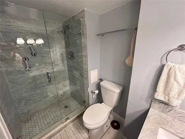 a view of a garden with palm trees