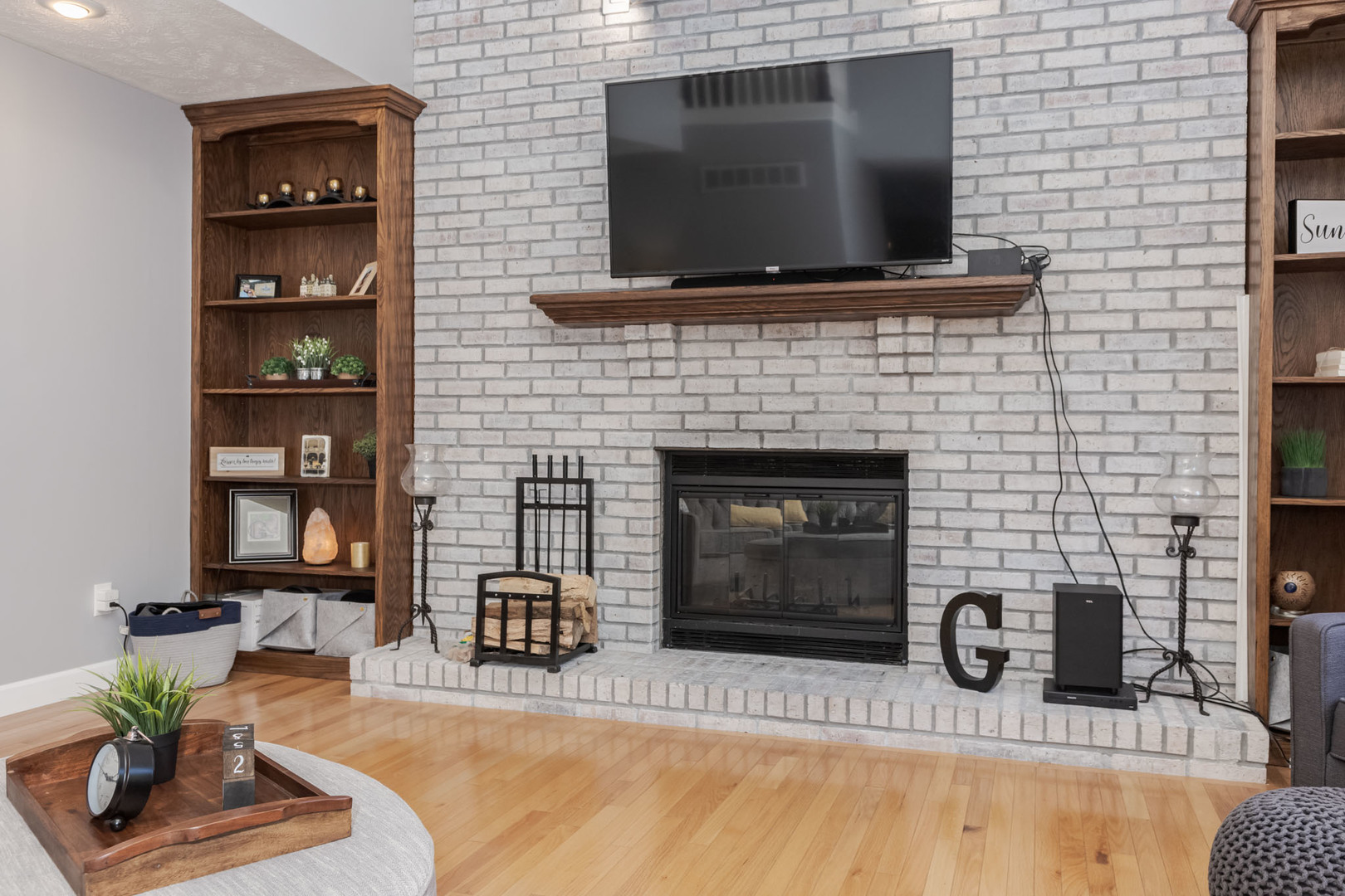 3308 Cumbria Drive Bloomington, IL 61704 - Photo 21 of 48 a living room with fireplace furniture and a flat screen tv