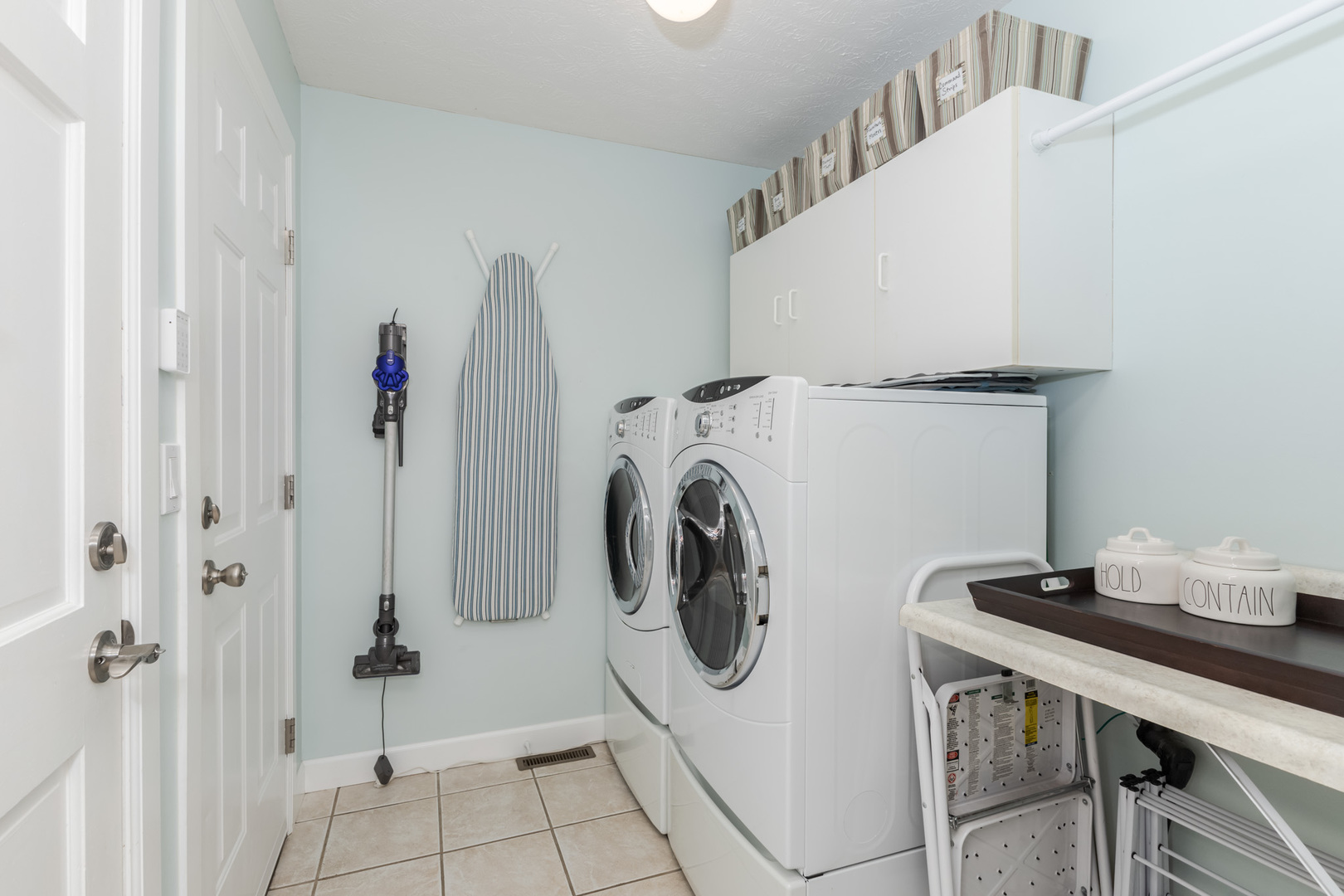 3308 Cumbria Drive Bloomington, IL 61704 - Photo 23 of 48 a view of a storage and utility room with washer and dryer