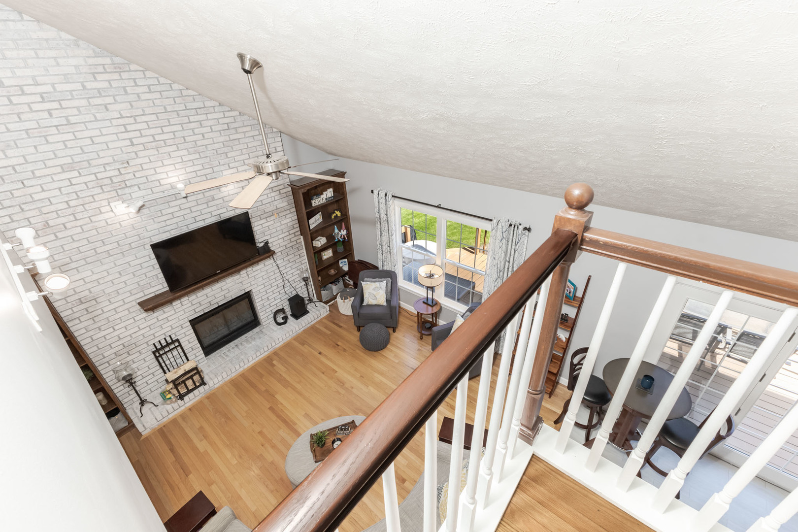 3308 Cumbria Drive Bloomington, IL 61704 - Photo 24 of 48 a living room with furniture and a flat screen tv