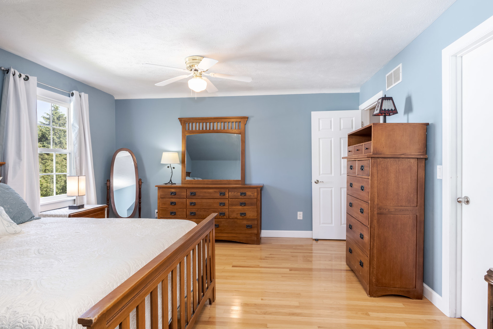 3308 Cumbria Drive Bloomington, IL 61704 - Photo 27 of 48 a bedroom with bed and wooden floor