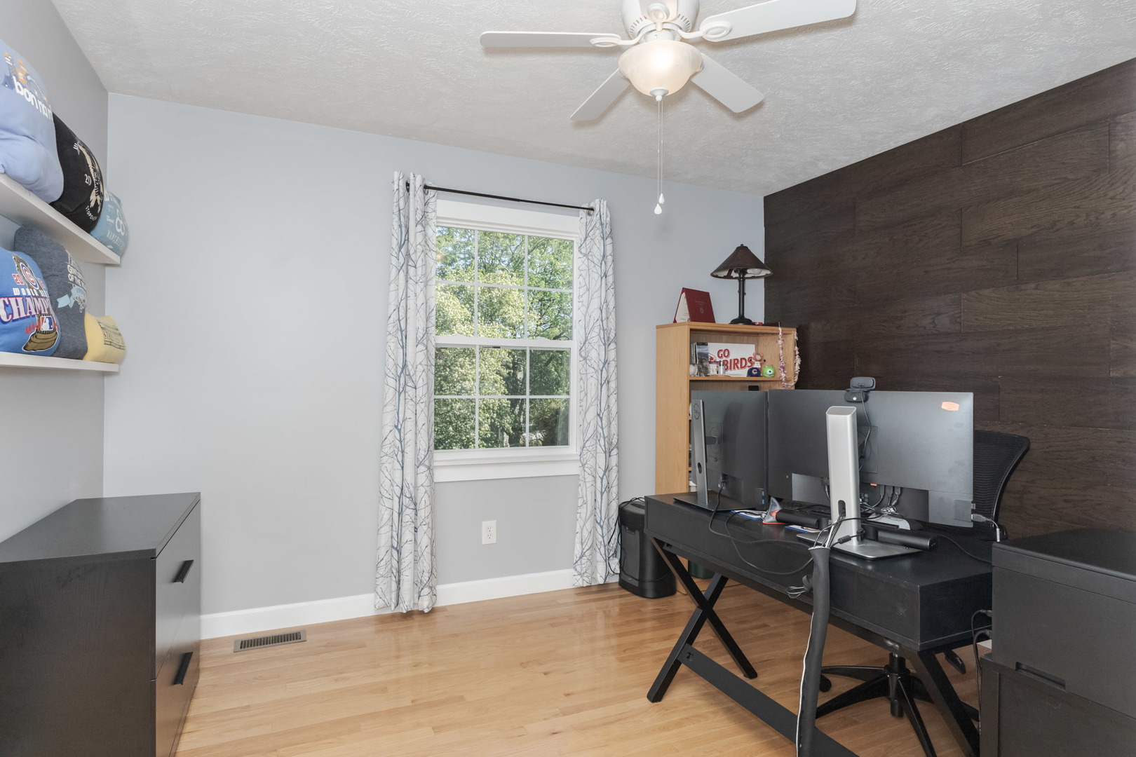 3308 Cumbria Drive Bloomington, IL 61704 - Photo 29 of 48 a view of a workspace with furniture and a window