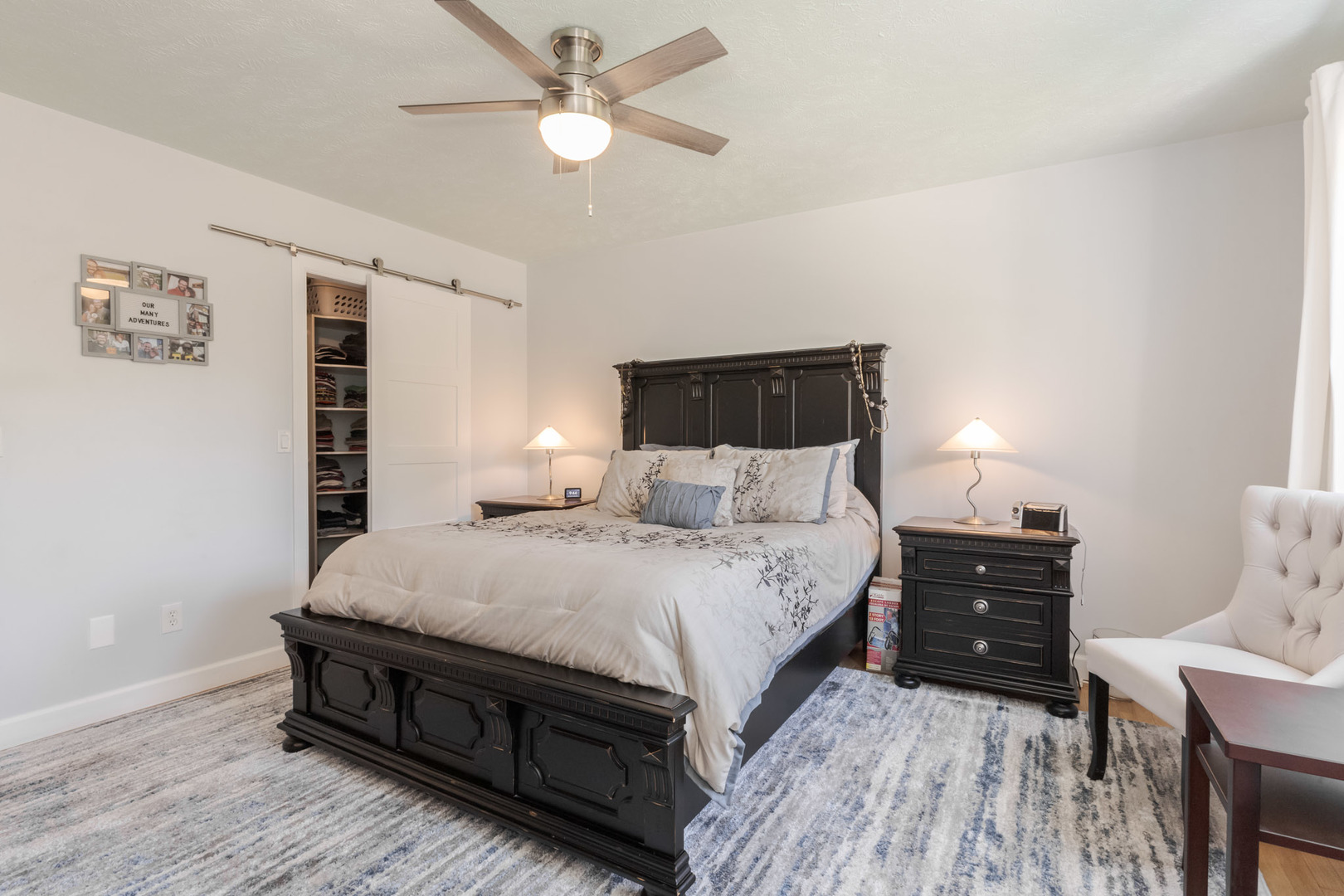 3308 Cumbria Drive Bloomington, IL 61704 - Photo 33 of 48 a bedroom with a bed and a chandelier