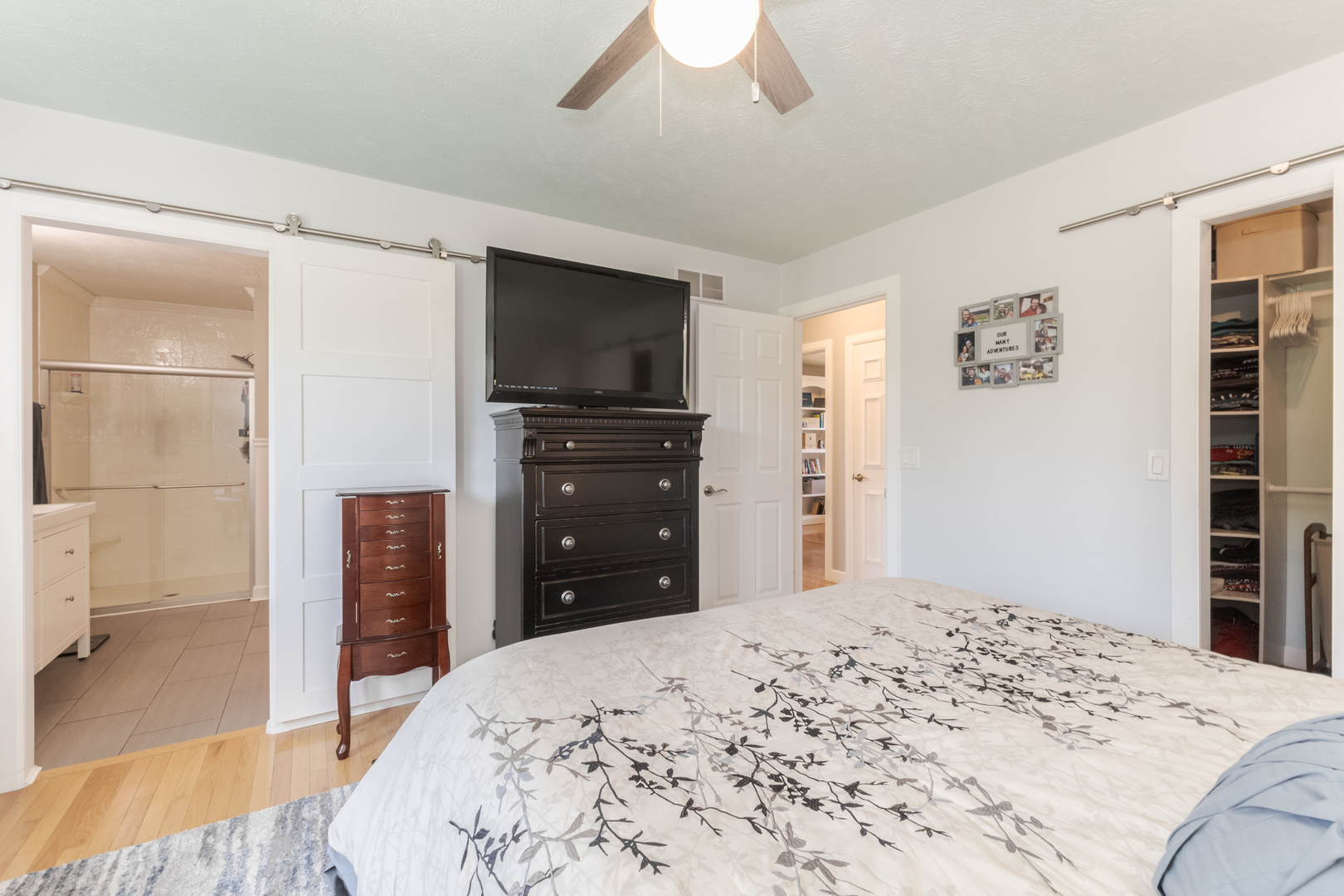 3308 Cumbria Drive Bloomington, IL 61704 - Photo 34 of 48 a bedroom with a bed and a flat screen tv