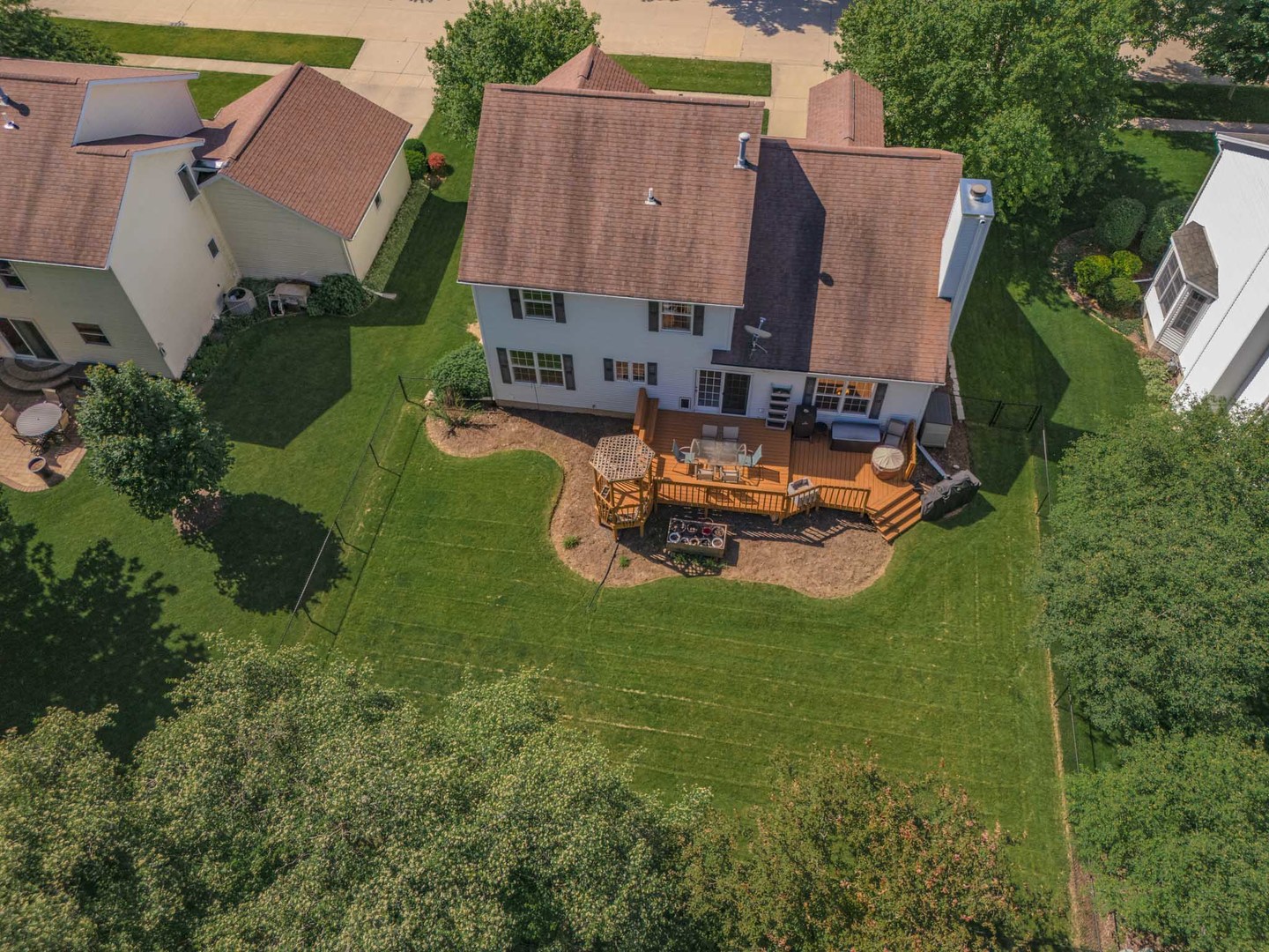 3308 Cumbria Drive Bloomington, IL 61704 - Photo 46 of 48 an aerial view of a house with a garden and lake view