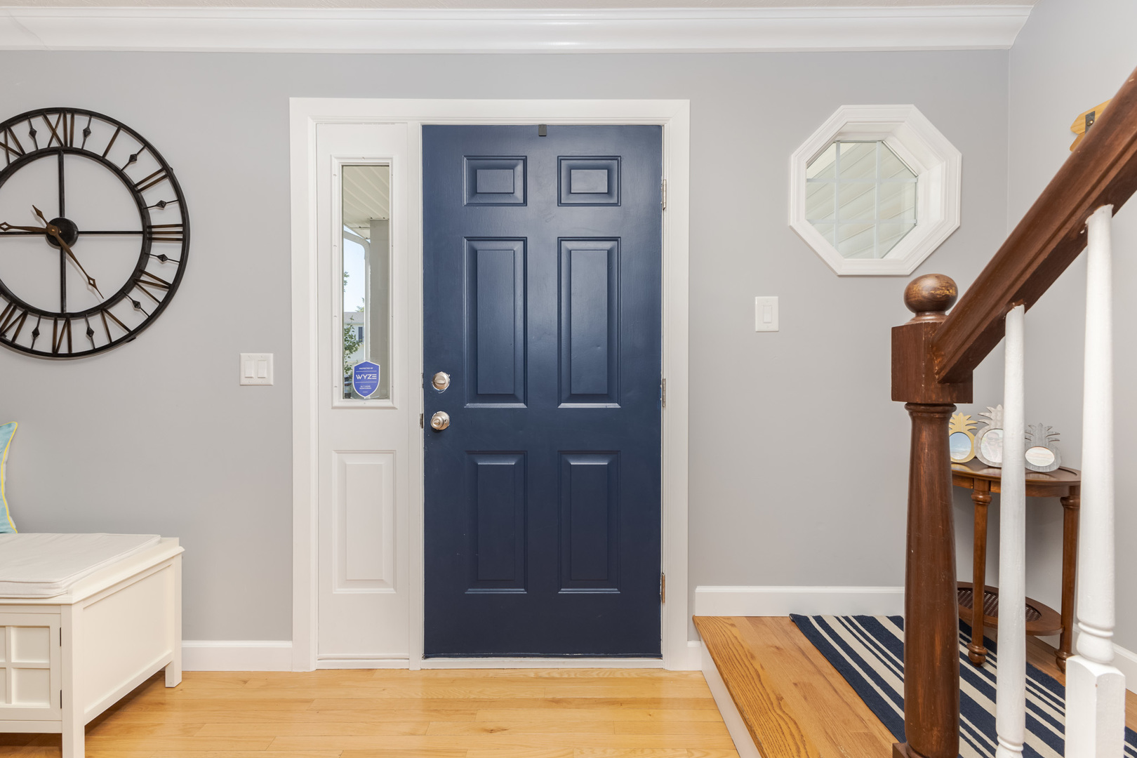 3308 Cumbria Drive Bloomington, IL 61704 - Photo 5 of 48 a view of a hallway to a room with wooden floor and furniture
