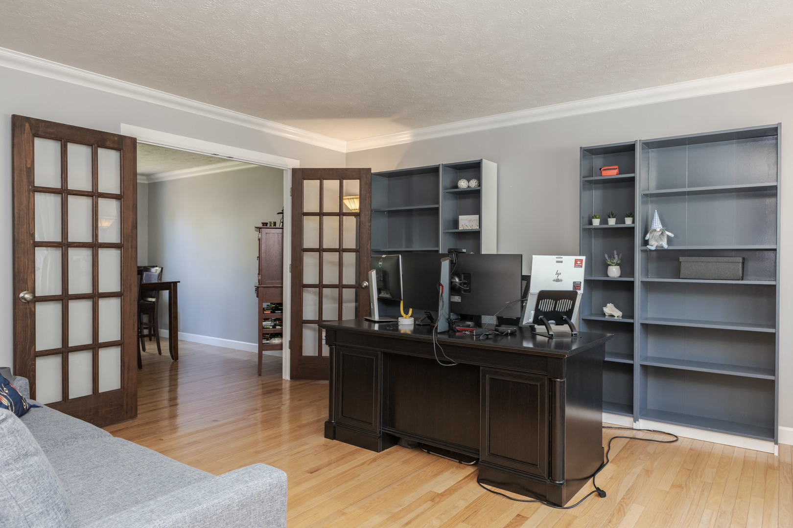 3308 Cumbria Drive Bloomington, IL 61704 - Photo 8 of 48 a living room with stainless steel appliances kitchen island granite countertop a rug a stove and a wooden floors