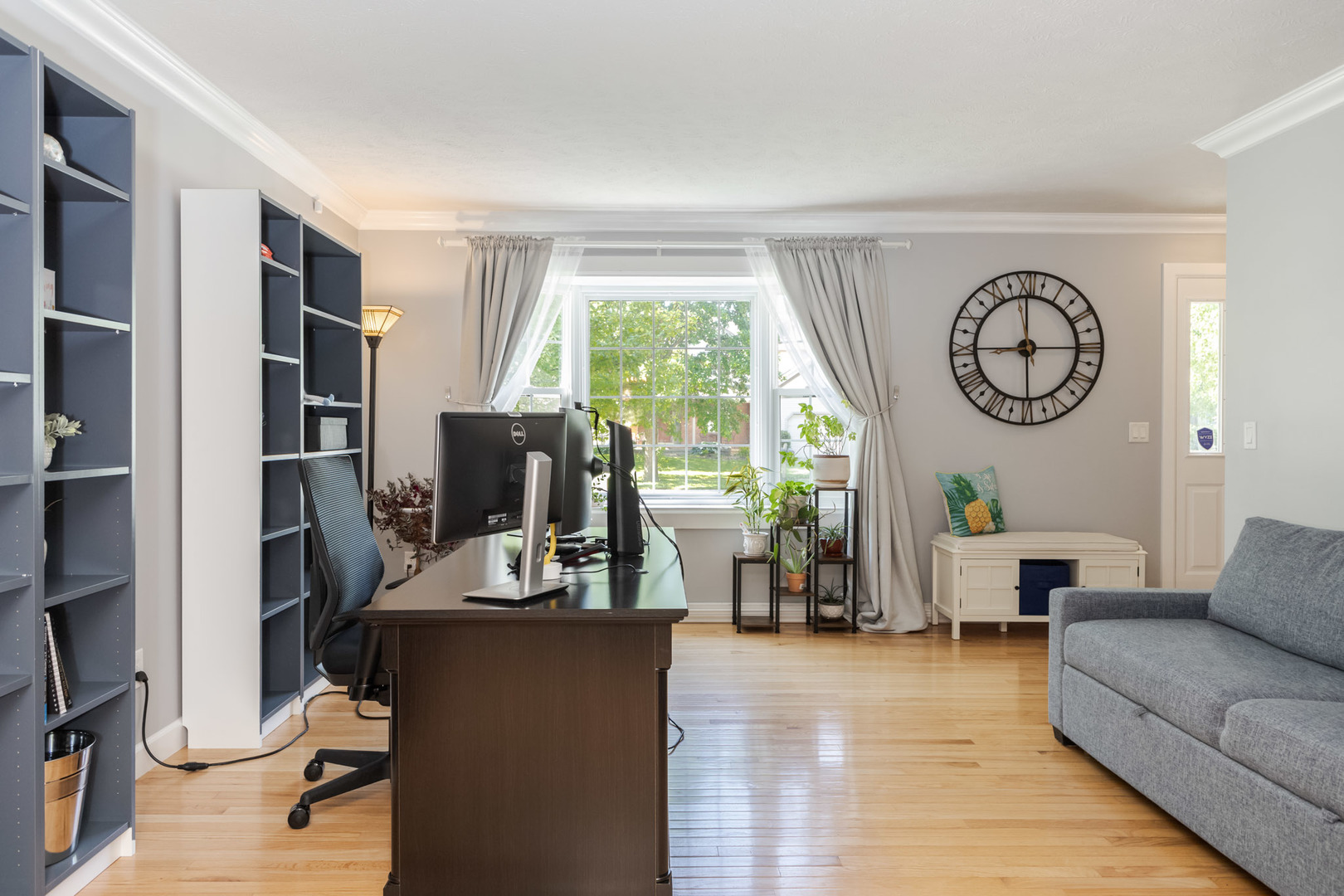 3308 Cumbria Drive Bloomington, IL 61704 - Photo 9 of 48 a living room with furniture a window and a flat screen tv