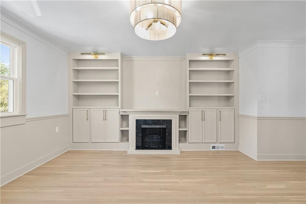 115 Elm Lane Coraopolis, PA 15108 - Photo 17 of 50 a view of a room with rack and a fireplace