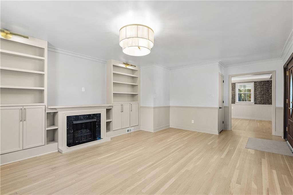 115 Elm Lane Coraopolis, PA 15108 - Photo 18 of 50 a view of empty room with wooden floor and fireplace