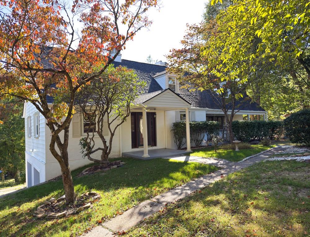115 Elm Lane Coraopolis, PA 15108 - Photo 2 of 50 a front view of a house with a yard and green space